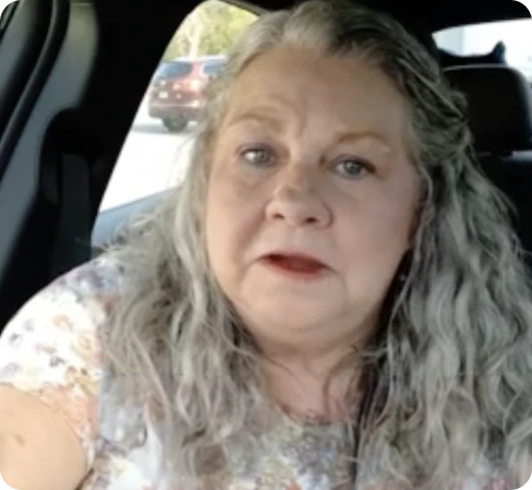 AlphaCur customer testimonial photo — woman smiling, highlighting neuropathy relief and nerve health support